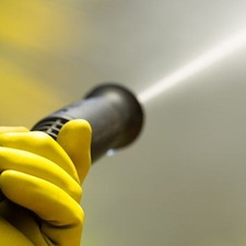 Soft Washing a House vs. Pressure Washing: Which Is Safer for Painted Siding?
